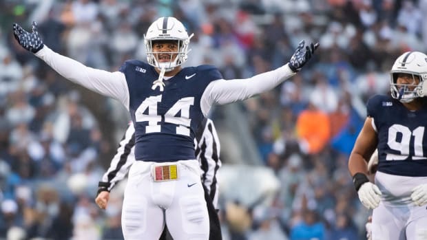 Penn State defensive end Chop Robinson (44) celebrates after sacking Massachusetts quarterback Taisun Phommachanh in the first half of a NCAA football game Saturday, Oct. 14, 2023, in State College, Pa. The Nittany Lions won, 63-0.